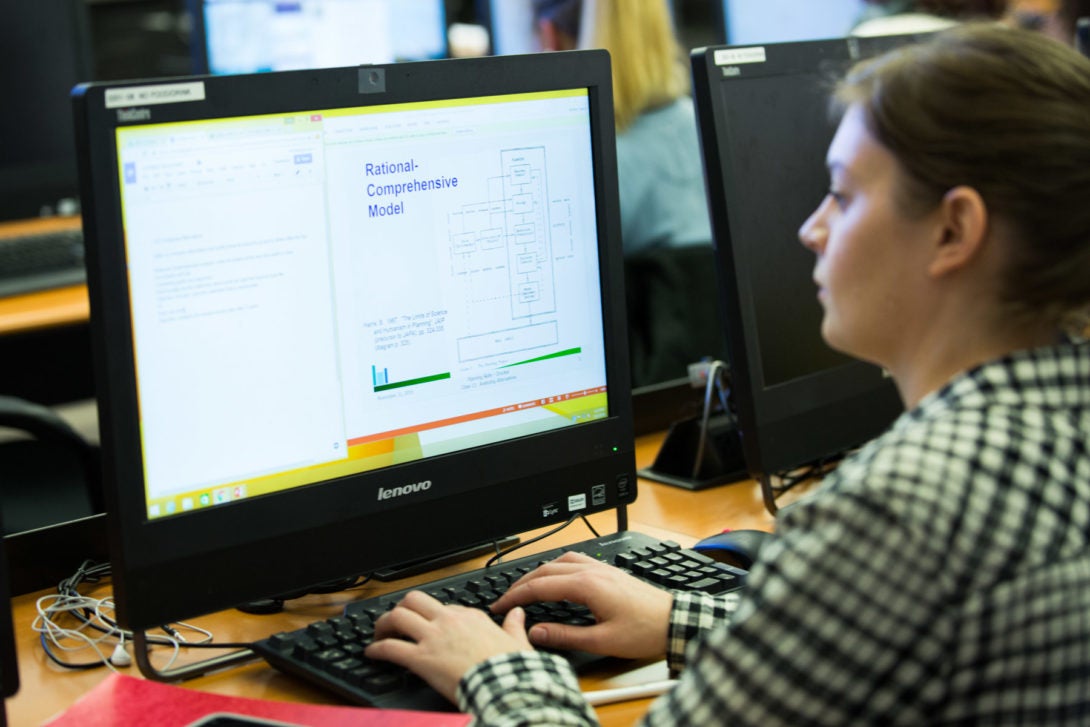 Student looking at a computer screen.