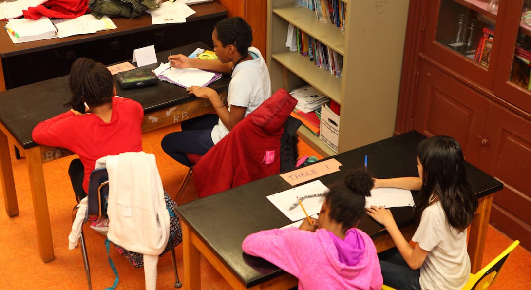 CPS students working on homework UIC ENGAGE tutoring