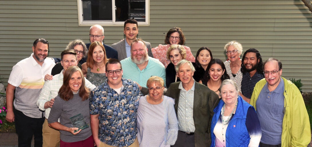 CUPPA Alumni, faculty, and friends pose during the Jim Marek Award presentation in 2022.