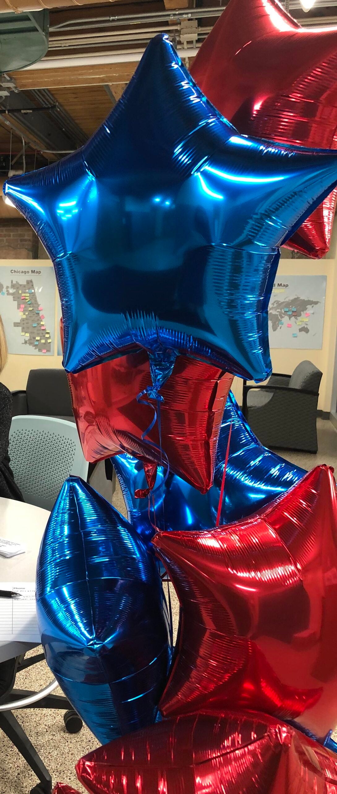 red and blue balloons on display